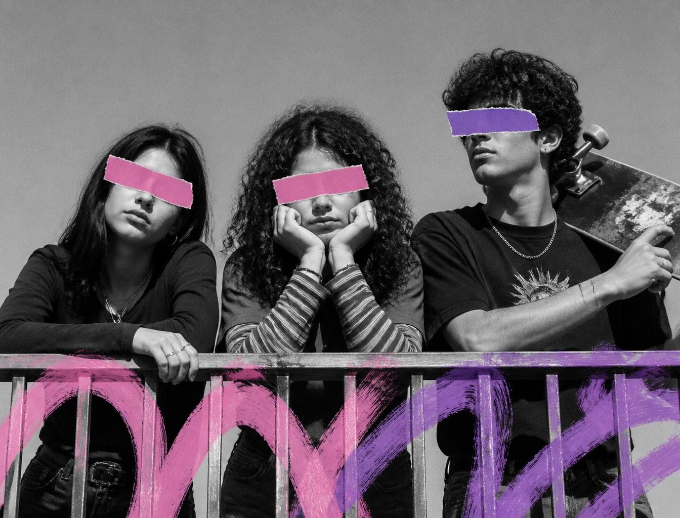 A black and white, medium shot captures three young people leaning on a railing against a clear sky. The person on the left, a young woman with dark hair, rests her arms on the railing, her head tilted slightly. In the center, a young woman with curly hair rests her chin on her hands, her gaze downcast. To the right, a young man with dark, curly hair holds a skateboard over his shoulder. All three have their eyes…