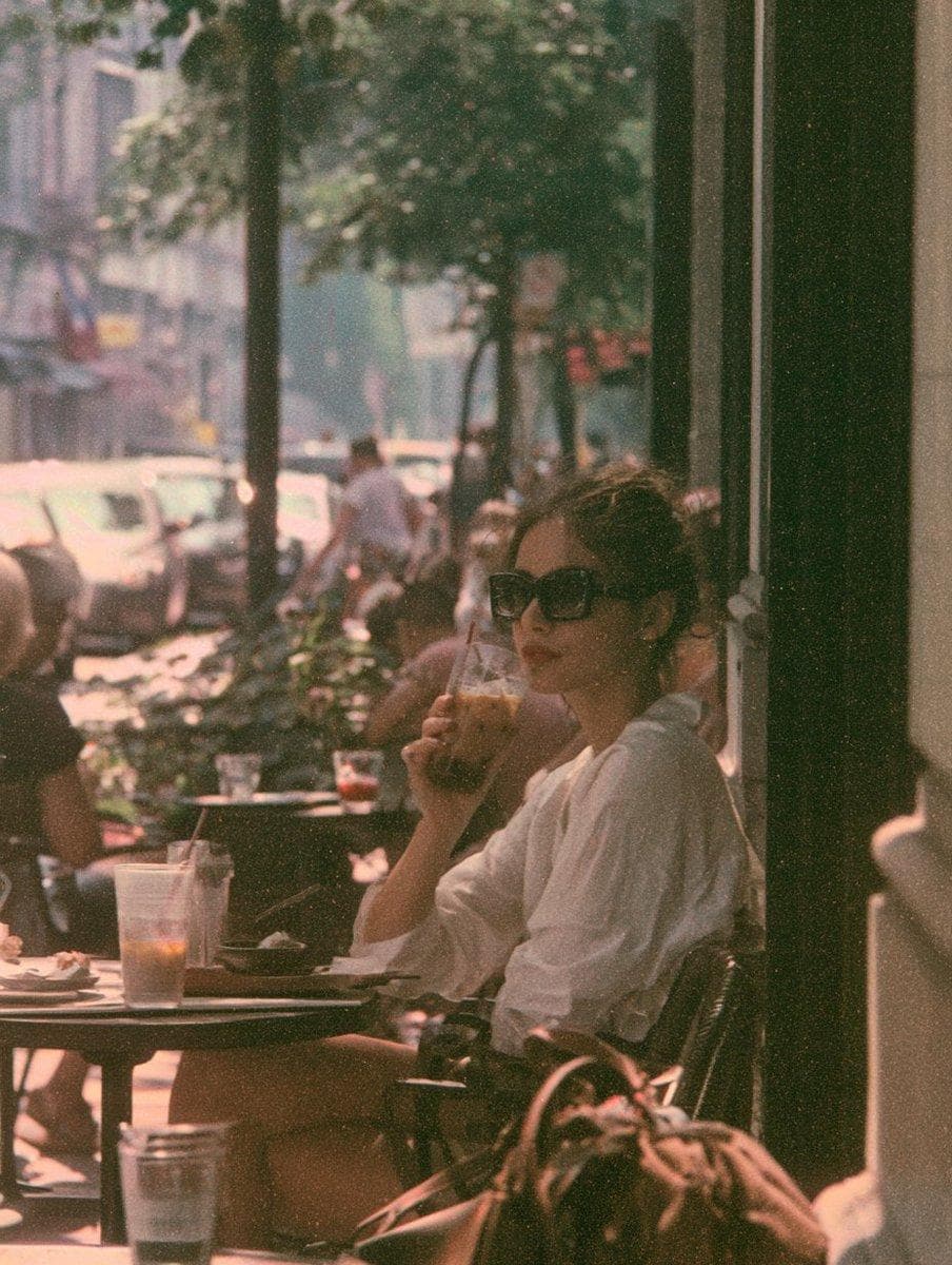 [Subject], autochrome, potato-starch grain rendering color as a pointillist mosaic, muted rose and sage and dust, exposure long enough that everything living has softened at the edges, the…