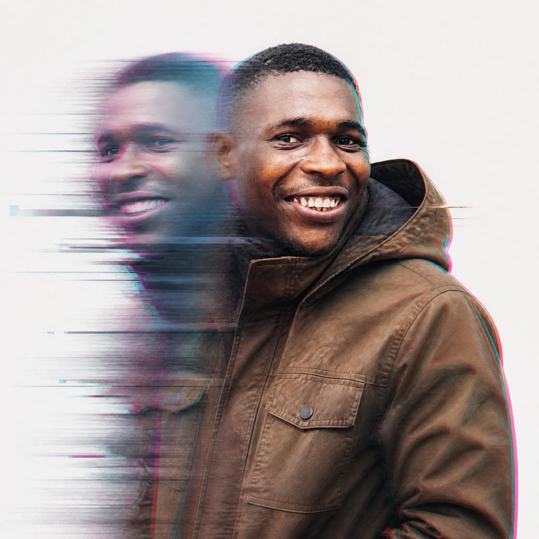 A double exposure, long exposure editorial photograph of a man Use image for face reference in a brown hooded utility jacket with sharp facial features Apply a digital glitch distortion effect with chromatic aberration (cyan and magenta color fringing), horizontal scan lines, and pixel sorting across the motion trails. Clean white backdrop, cinematic lighting, 35mm lens, high…